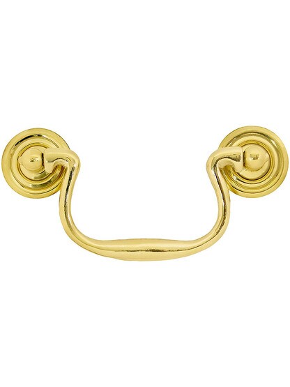 Swan-Neck Brass Bail Pull with Ringed Round Rosettes ‚Äì 3 ¬Ω‚Äù Center-to-Center in Unlacquered Brass Finish.